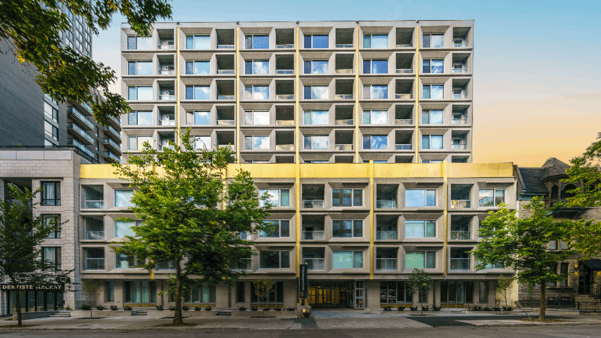 1200 Mackay Building with animated text Canadian Urban Limited Expands Montreal Portfolio with Acquisition of Landmark Multifamily Asset at 1200 Mackay